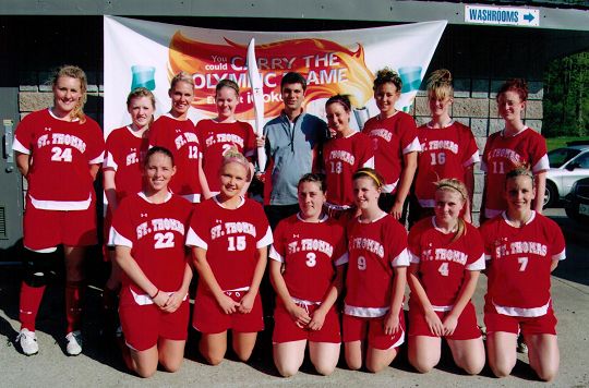 Premier Women with Olympic Torch